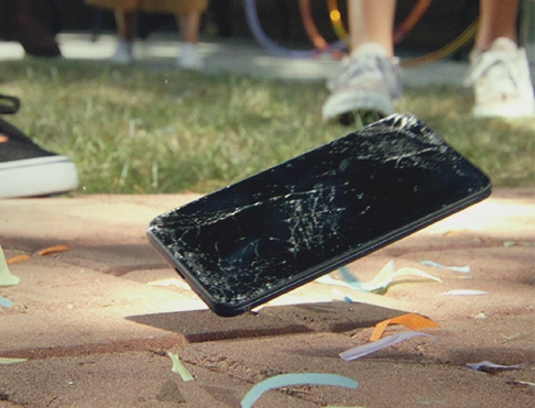 A cell phone falling on the ground