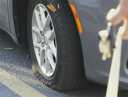 A deflated car tire