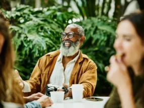 A happy man who is about the age of receiving Social Security benefits